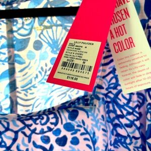 Brand new w tags. Cute summer dress. Size medium.